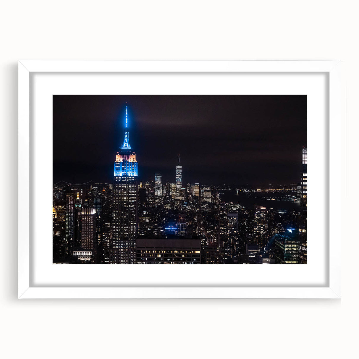 Abstract art print featuring swirling blue and white patterns on canvas, suitable for modern dining room decor.