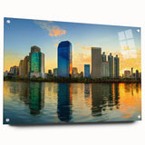 Large abstract wall art depicting dynamic swirls in vibrant blue and gold tones on canvas.