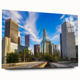 Large abstract wall art on canvas featuring swirling blue and gray tones, ideal for modern bedroom or dining room ambiance.