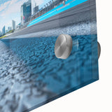 Large abstract wall art in mid-century modernist style, featuring bold geometric shapes in orange and teal.