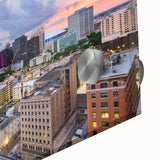 Large abstract wall art in vibrant orange and blue tones on canvas, ideal for dining room ambiance.