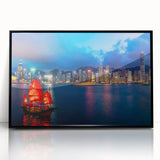 Large abstract wall art featuring swirling blue and gold tones on canvas, ideal for modern living room decor.