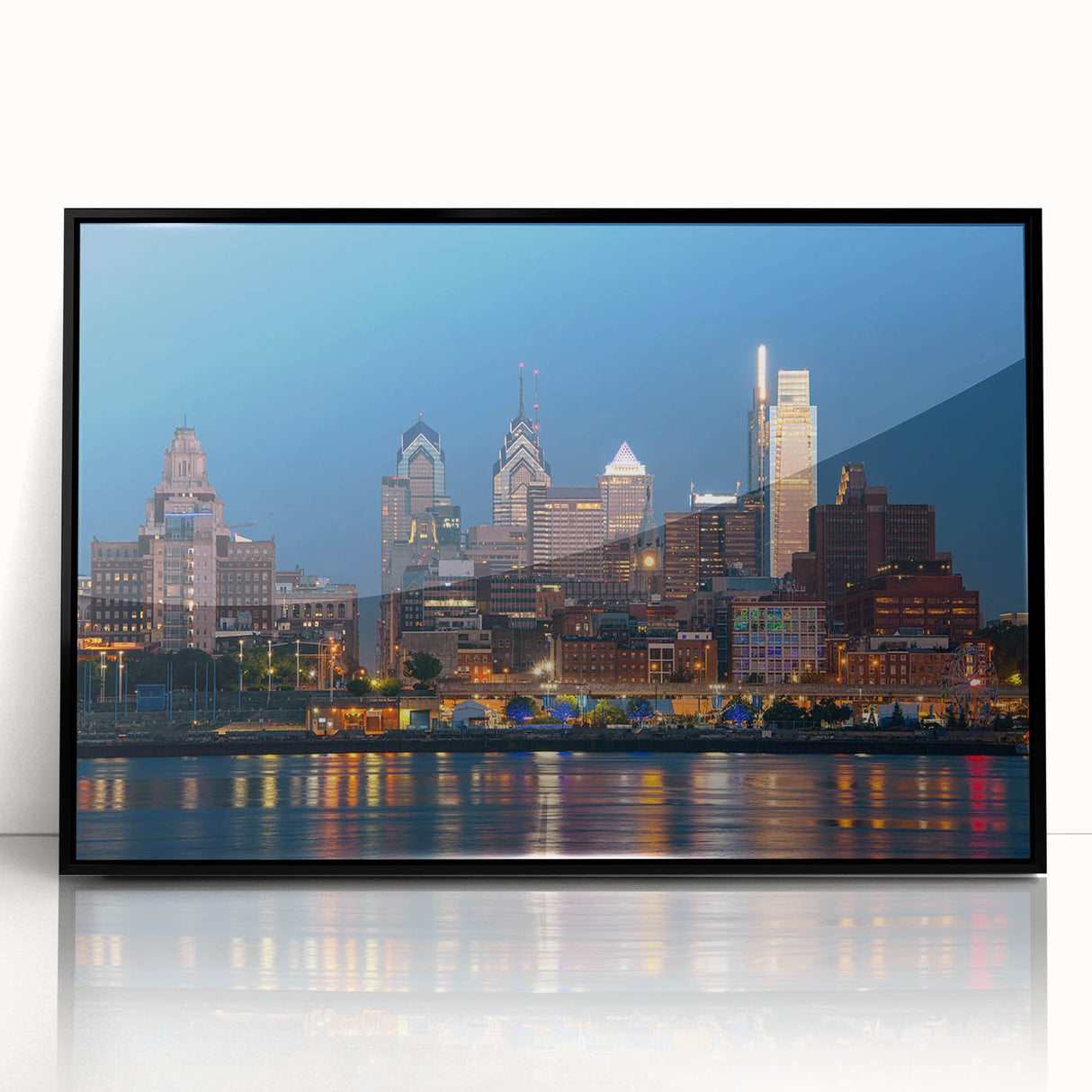 Large abstract wall art featuring swirling blue and gray tones on canvas.