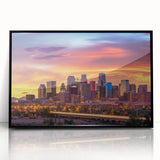 Large abstract wall art featuring swirling blue and gray tones on canvas, ideal for modern living room decor.