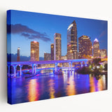 Large abstract canvas print in vibrant blue and orange, ideal for kitchen wall art.