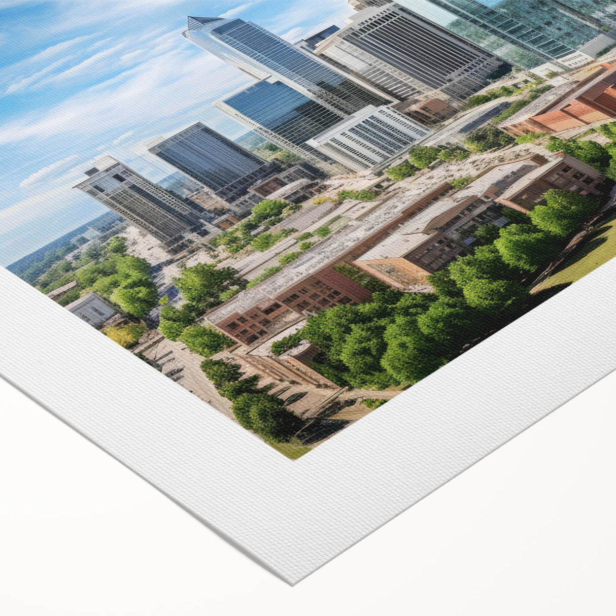 Art deco poster of a stylized sunburst in gold and black, printed on framed canvas.