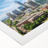 Art deco poster of a stylized sunburst in gold and black, printed on framed canvas.