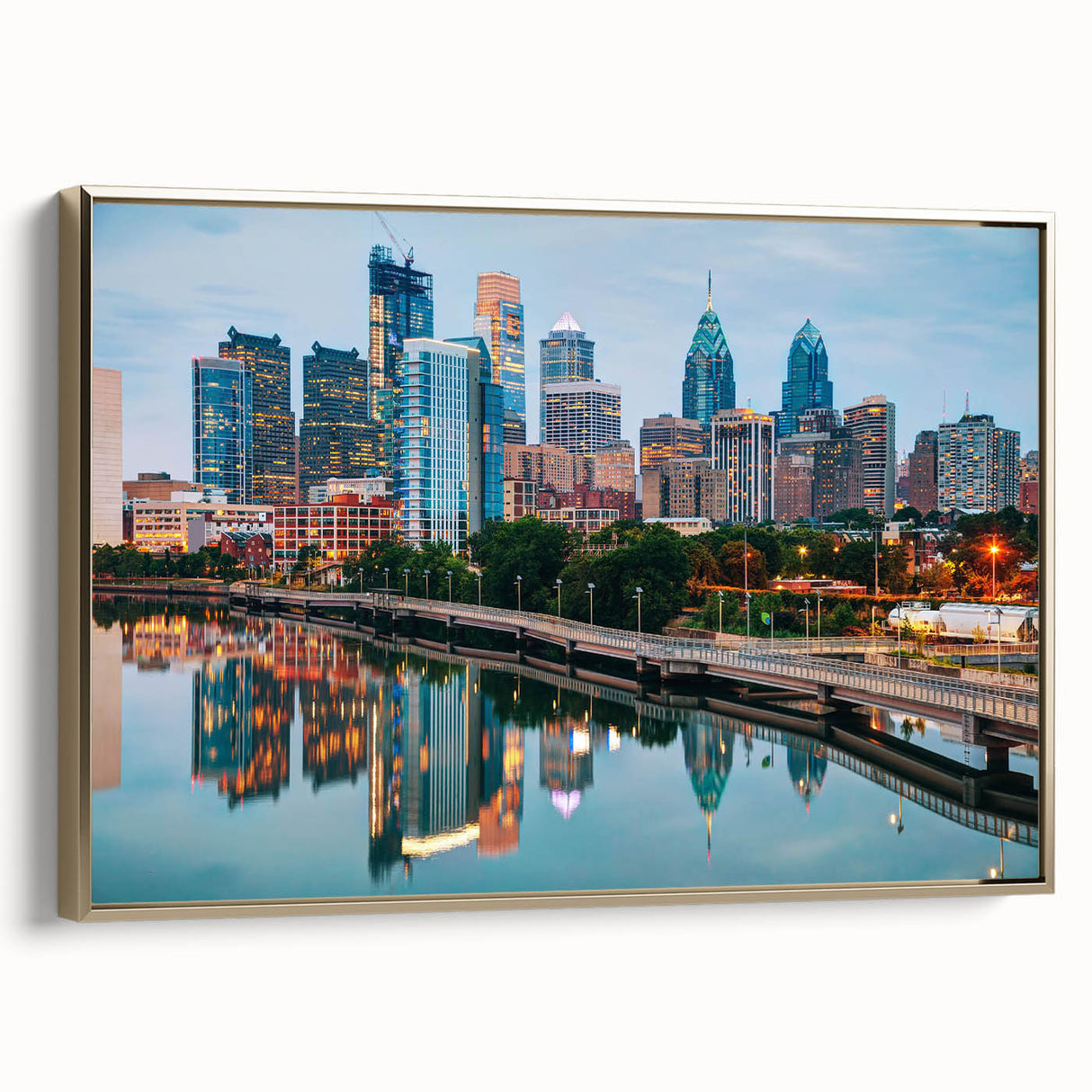 Landscape painting of a serene lake at sunset in muted orange and blue tones on a rolled canvas.