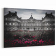 Elegant Black and White Palace Facade with Vibrant Floral Gardens