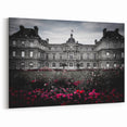 Elegant Black and White Palace Facade with Vibrant Floral Gardens