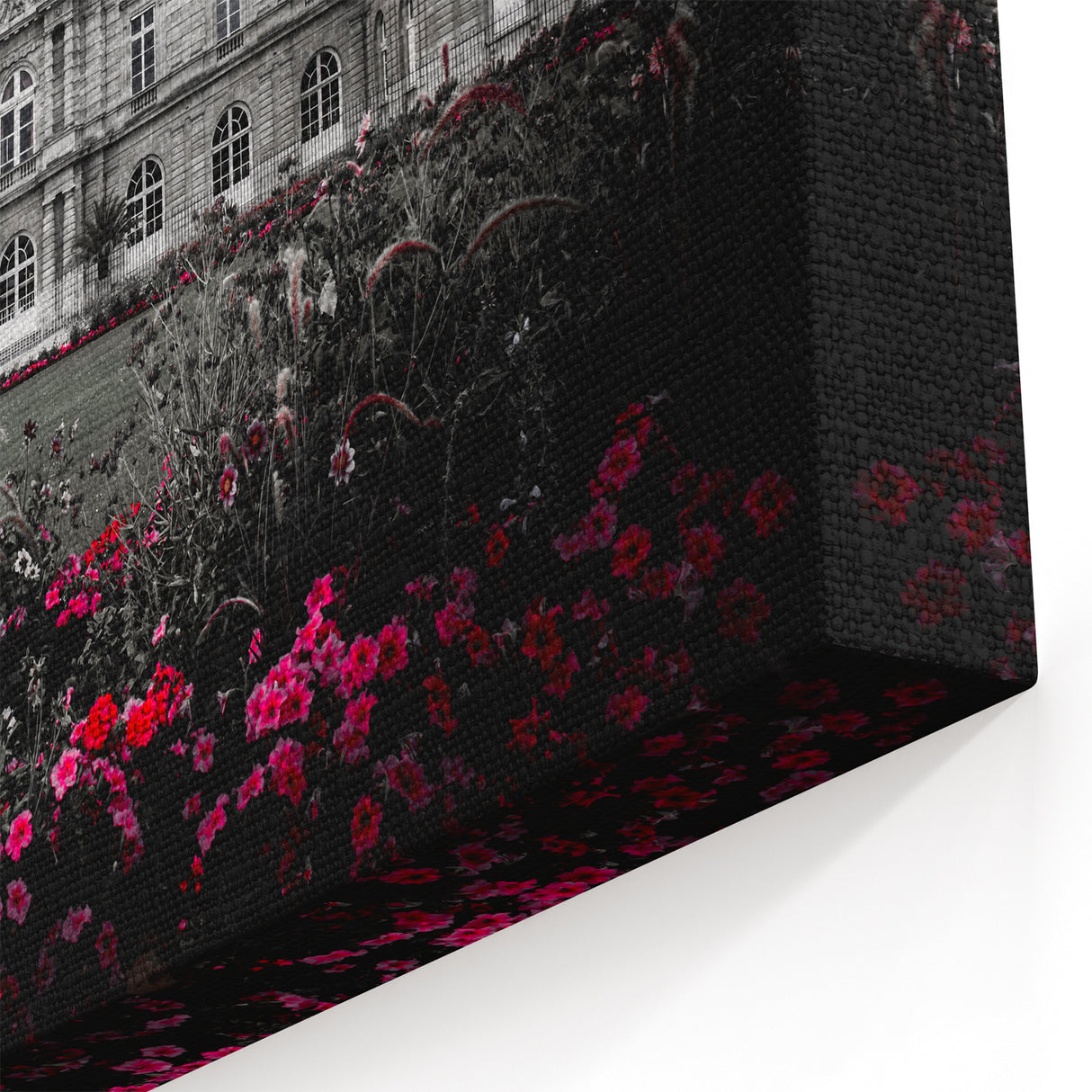 Elegant Black and White Palace Facade with Vibrant Floral Gardens