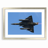Modern Aviation Art: Fighter Jet in Flight Against Blue Sky Canvas Print