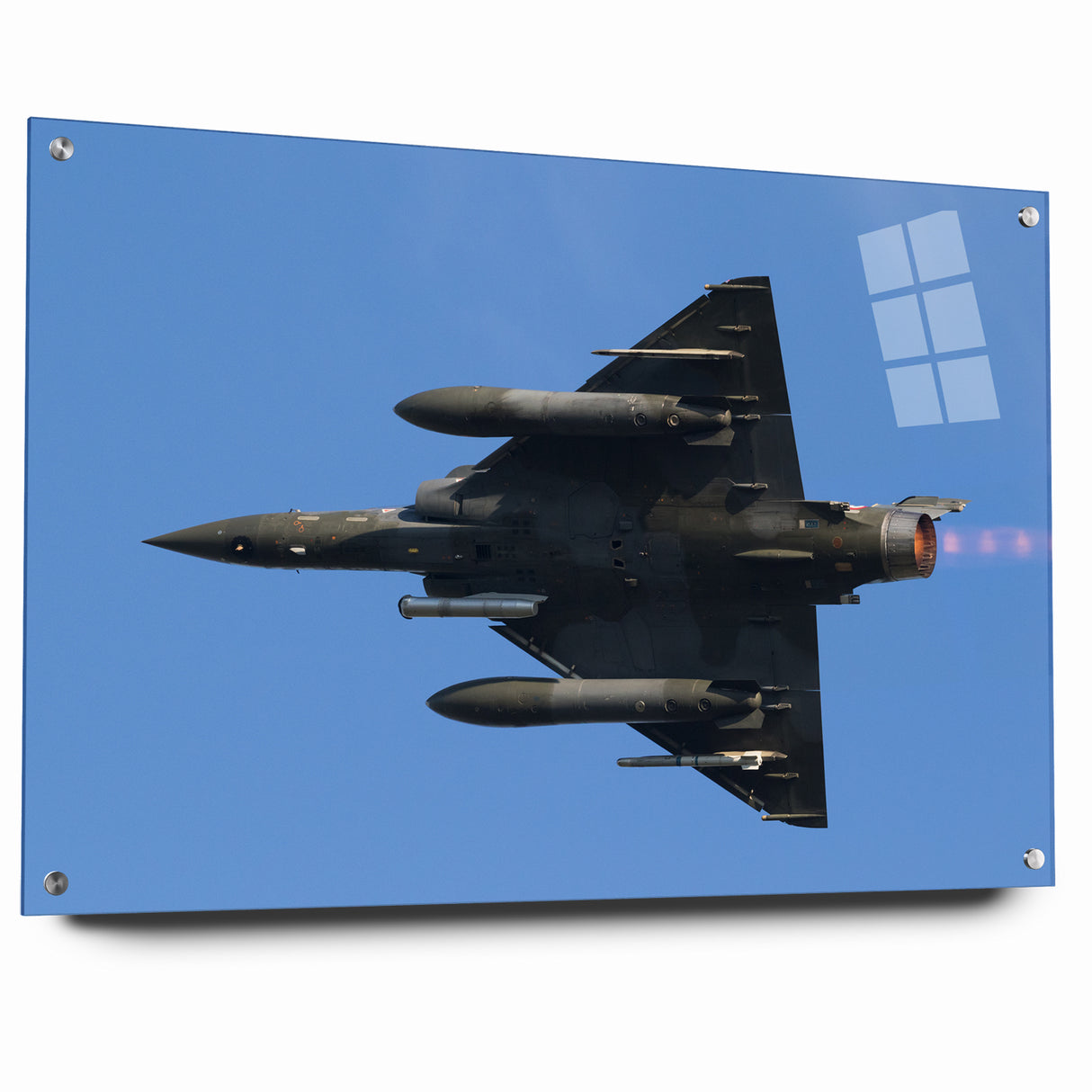 Modern Aviation Art: Fighter Jet in Flight Against Blue Sky Canvas Print