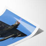 Modern Aviation Art: Fighter Jet in Flight Against Blue Sky Canvas Print