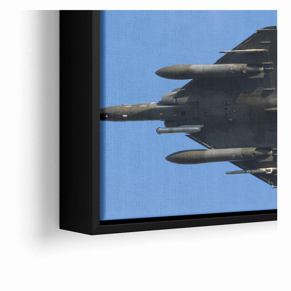 Modern Aviation Art: Fighter Jet in Flight Against Blue Sky Canvas Print