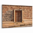 Masonry Wall Art - Ornate Wooden Door on Brick and Stone Wall Canvas Print