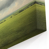 Vintage Landscape Art - Lush Green Fields Under Dramatic Clouds