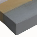 Abstract wall art canvas showcasing vibrant geometric shapes in bold colors, elegantly rolled and securely packaged in a cardboard tube for safe delivery.