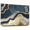Abstract wall art featuring vibrant splashes of blue, orange, and yellow hues on a textured canvas, ideal for contemporary decor.