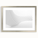Abstract art print featuring swirling blue and gray tones on a framed canvas, suitable for bedroom or dining room decor.