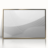 Mid-century modernist art featuring geometric shapes in gold and black tones on a framed acrylic print.