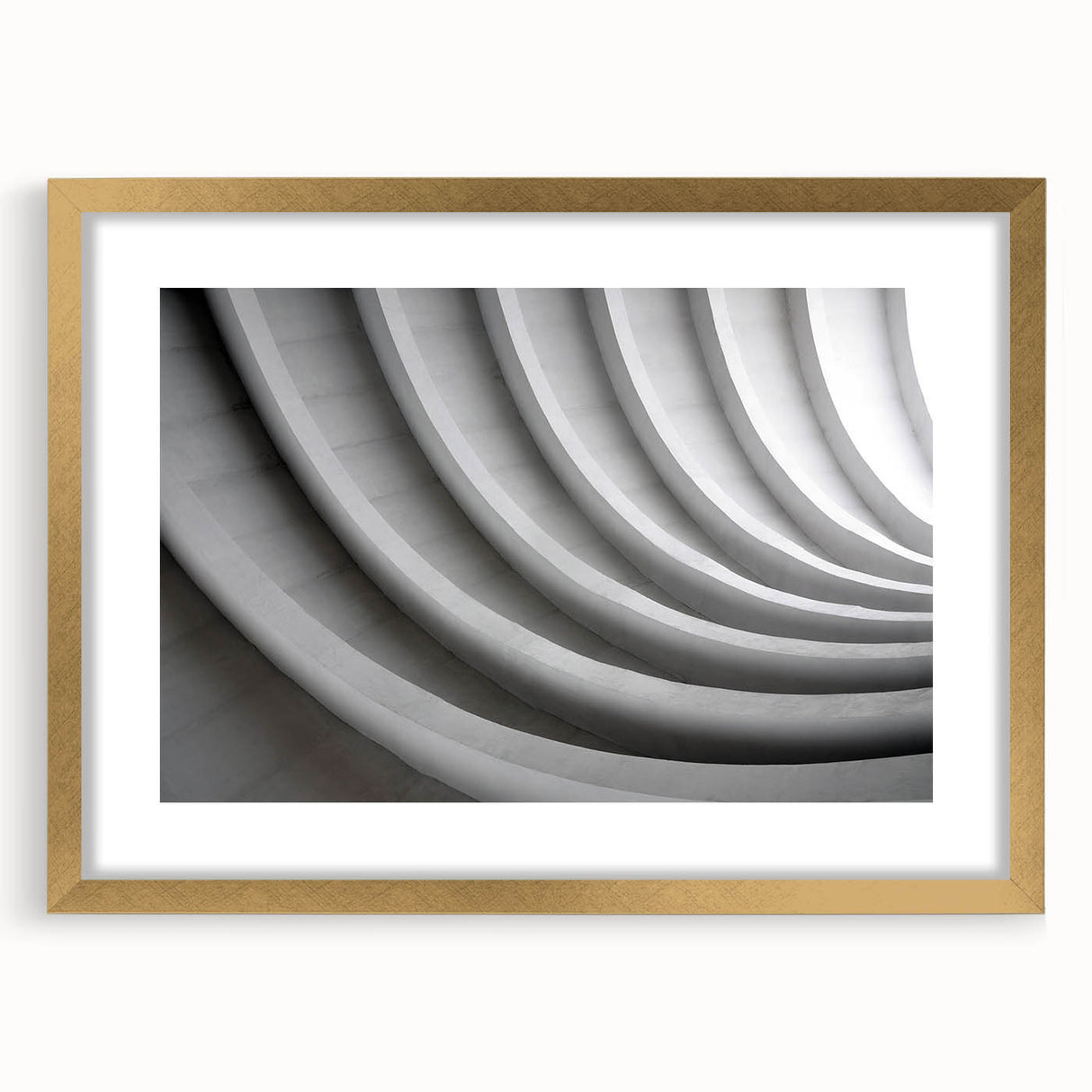 Textured art depicting abstract swirls in gold and beige tones on a framed canvas, suitable for bedroom art.