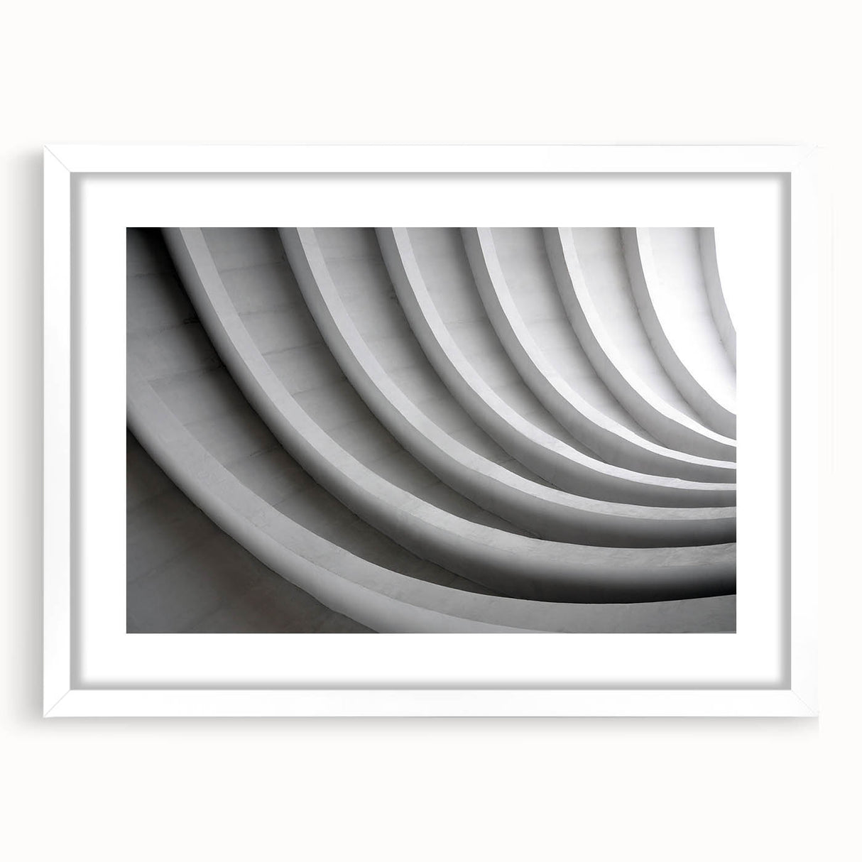 Extra large abstract art print featuring textured swirls in neutral tones, framed in white, ideal for living room decor.