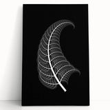 Stretched canvas artwork depicting a vibrant abstract design with bold colors, leaning against a textured wall, ideal for modern home decor and art enthusiasts.