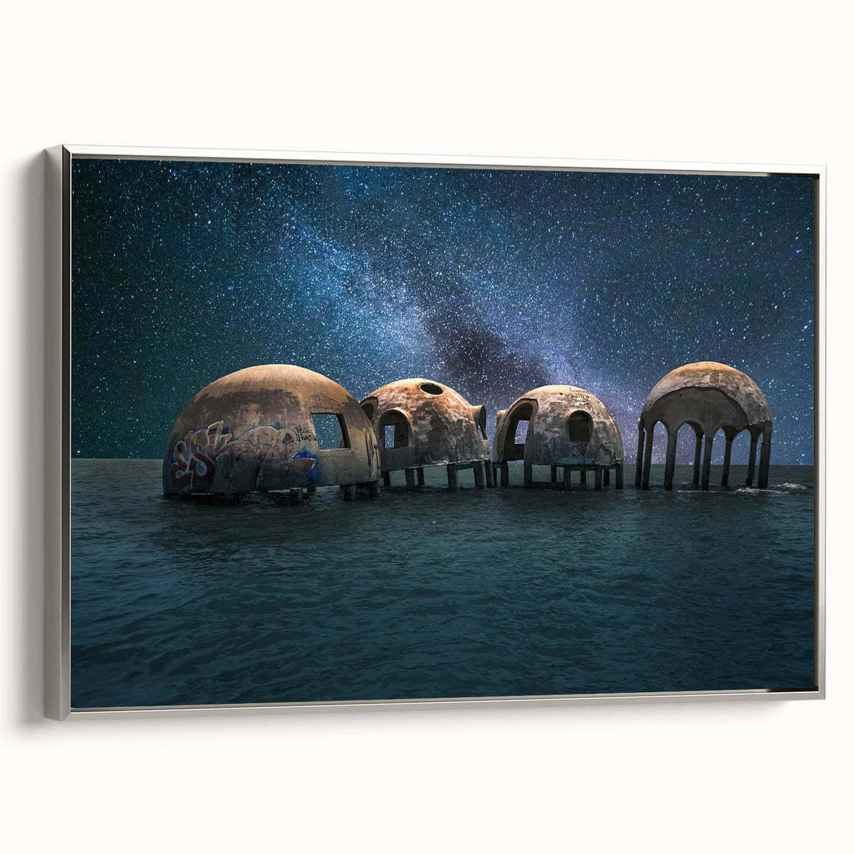 Framed canvas of a vintage landscape painting, showcasing a colorful forest scene on a black background.
