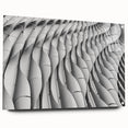 Large abstract wall art on acrylic glass featuring swirling blue and gray tones, suitable for bedroom or dining room decor.
