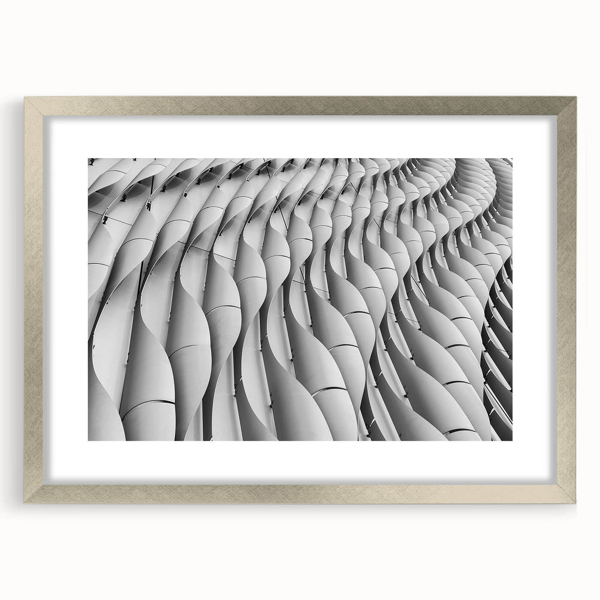 Abstract art print featuring swirling blue and gray tones on a framed canvas, suitable for dining room or bedroom decor.