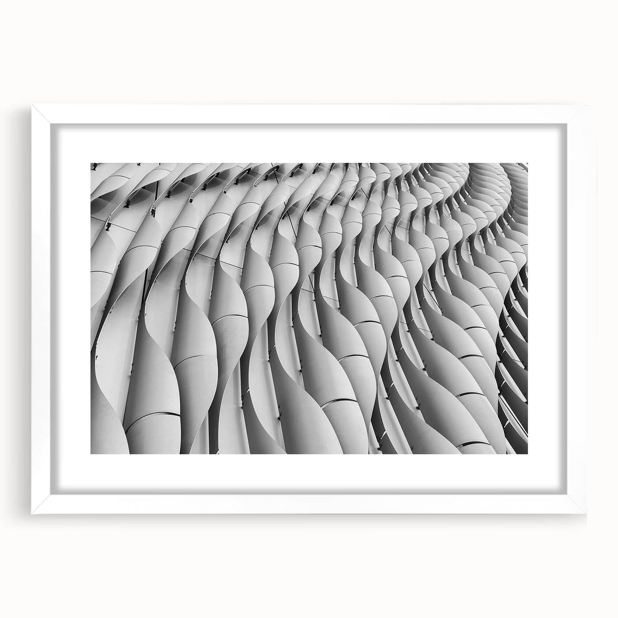 Extra large abstract art print featuring textured swirls in neutral tones, displayed in a white frame.