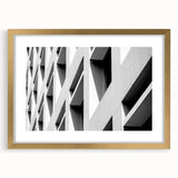 Extra large abstract art print with textured swirls in earth tones, framed in gold, ideal for living room decor.