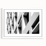 Textured abstract art print in muted gray and blue tones on a white framed canvas, suitable for bedroom wall decor.