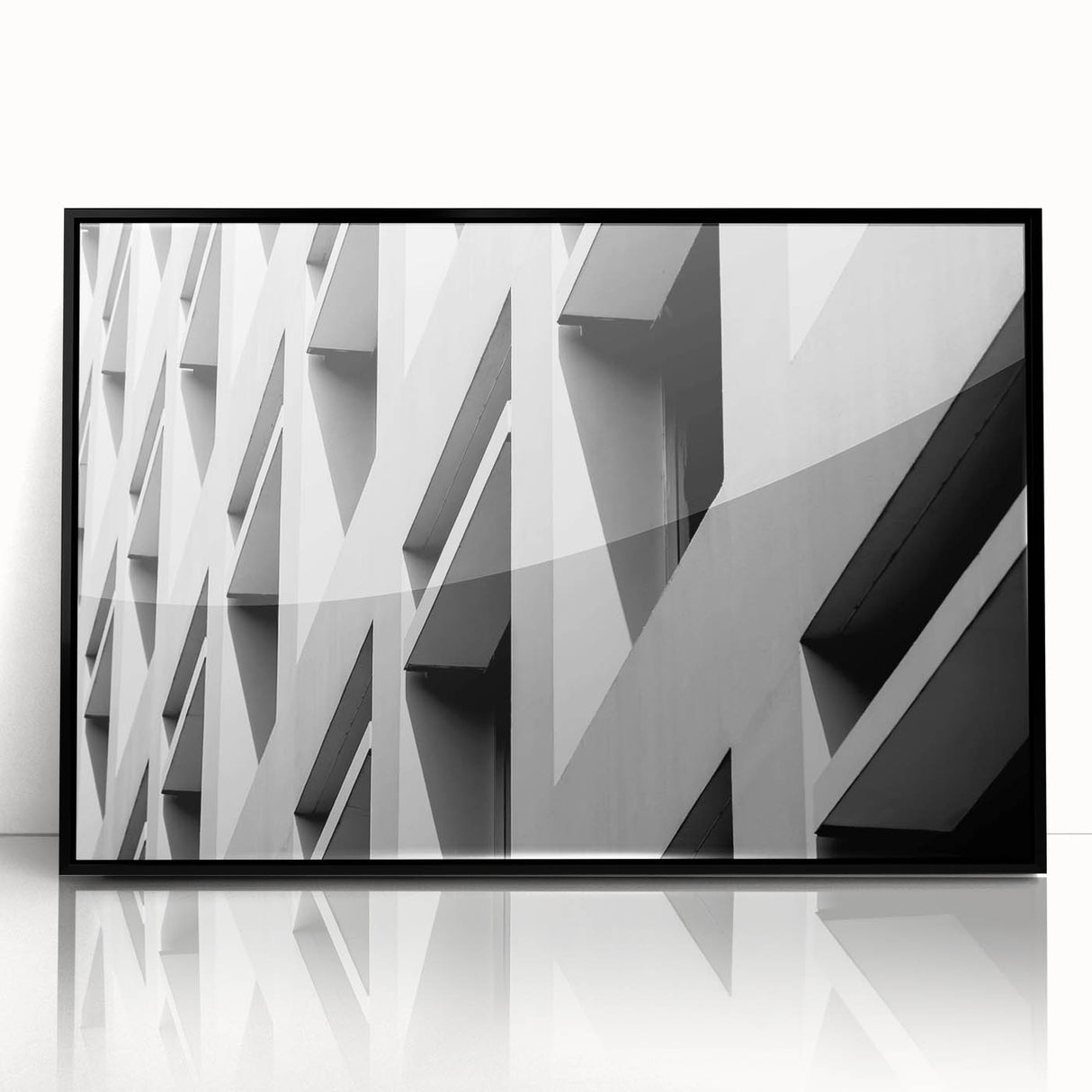 Large abstract wall art featuring swirling blue and gold patterns on a framed acrylic print.