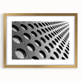 Abstract textured art print in earthy tones on a framed canvas, suitable for bedroom ambiance.