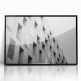 Large abstract wall art featuring swirling blue and grey tones on a framed acrylic, suitable for modern art wall decor.