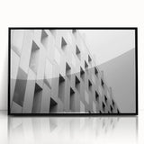 Large abstract wall art featuring swirling blue and grey tones on a framed acrylic, suitable for modern art wall decor.