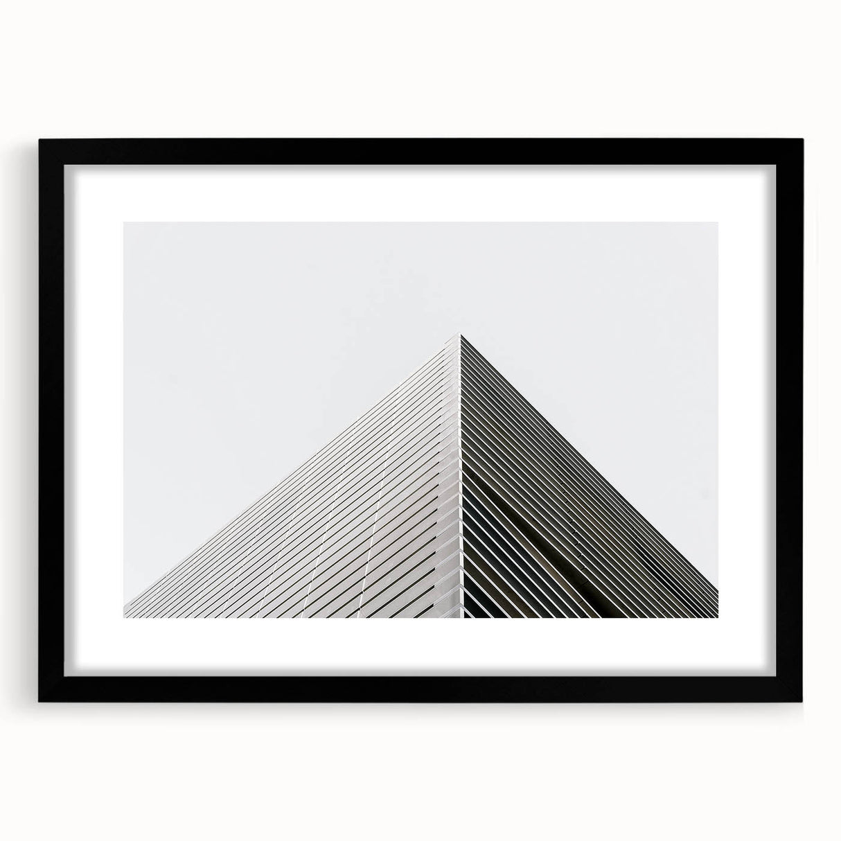 Extra large abstract art print featuring vibrant, colorful textures on a framed black canvas, ideal for living room decor.