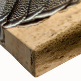 Close-up of a vibrant stretched canvas showcasing abstract art with bold colors and intricate details, perfect for modern home decor or art enthusiasts.