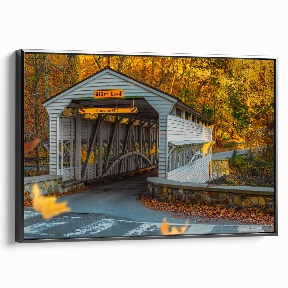 Black and white landscape art painting on a framed canvas, featuring a serene tree-lined river.