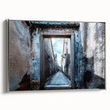 Framed canvas depicting a vintage-style landscape art painting with colorful elements against a black background.