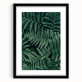 Black-framed artwork featuring an abstract landscape design, mounted with a white mat, showcasing a modern aesthetic ideal for contemporary home decor.