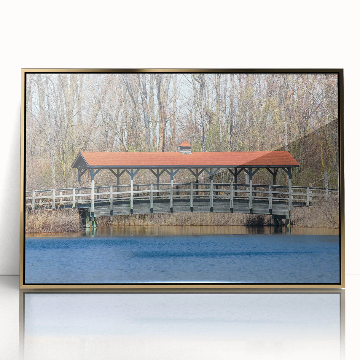 Framed acrylic print of an abstract design in gold and white tones, mid-century modernist style.