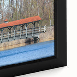 Framed canvas featuring textured black wall art with colorful abstract designs, ideal for living room decor.