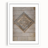 Abstract art print featuring swirling blue and gray tones on a white framed canvas.
