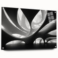 Large abstract wall art on acrylic glass featuring swirling blue and gray tones, suitable for bedroom or dining room decor.