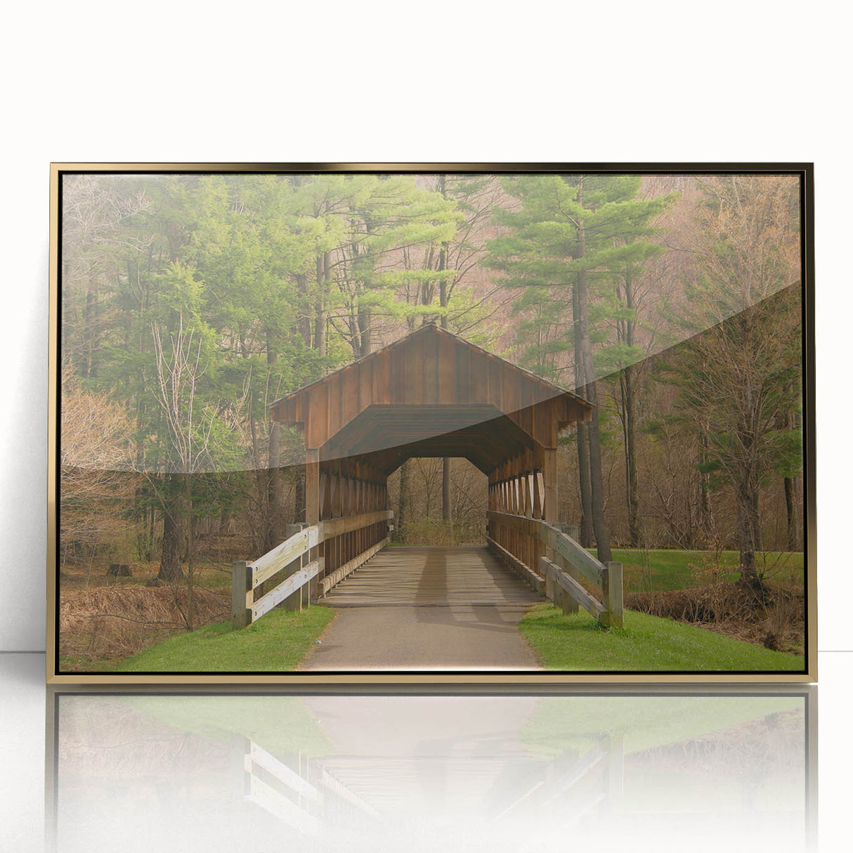 Large art print of a mid-century modernist abstract design in gold and black tones on framed acrylic.