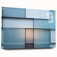 Large abstract wall art on acrylic glass, featuring swirling blue and gray tones.