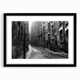 Extra large abstract art print featuring vibrant, colorful textures on a framed black canvas, ideal for living room decor.